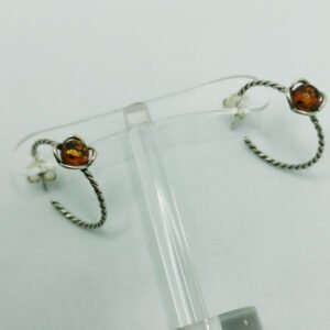 Orecchini semicerchio con fiorellino