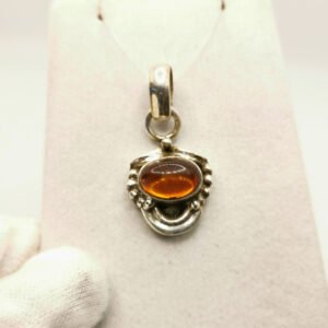 Etnic engraved pendant - oval Amber stone