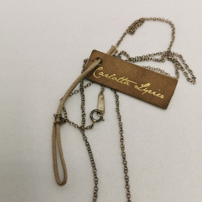 Carlotta Lyrics - Feather - immagine 3